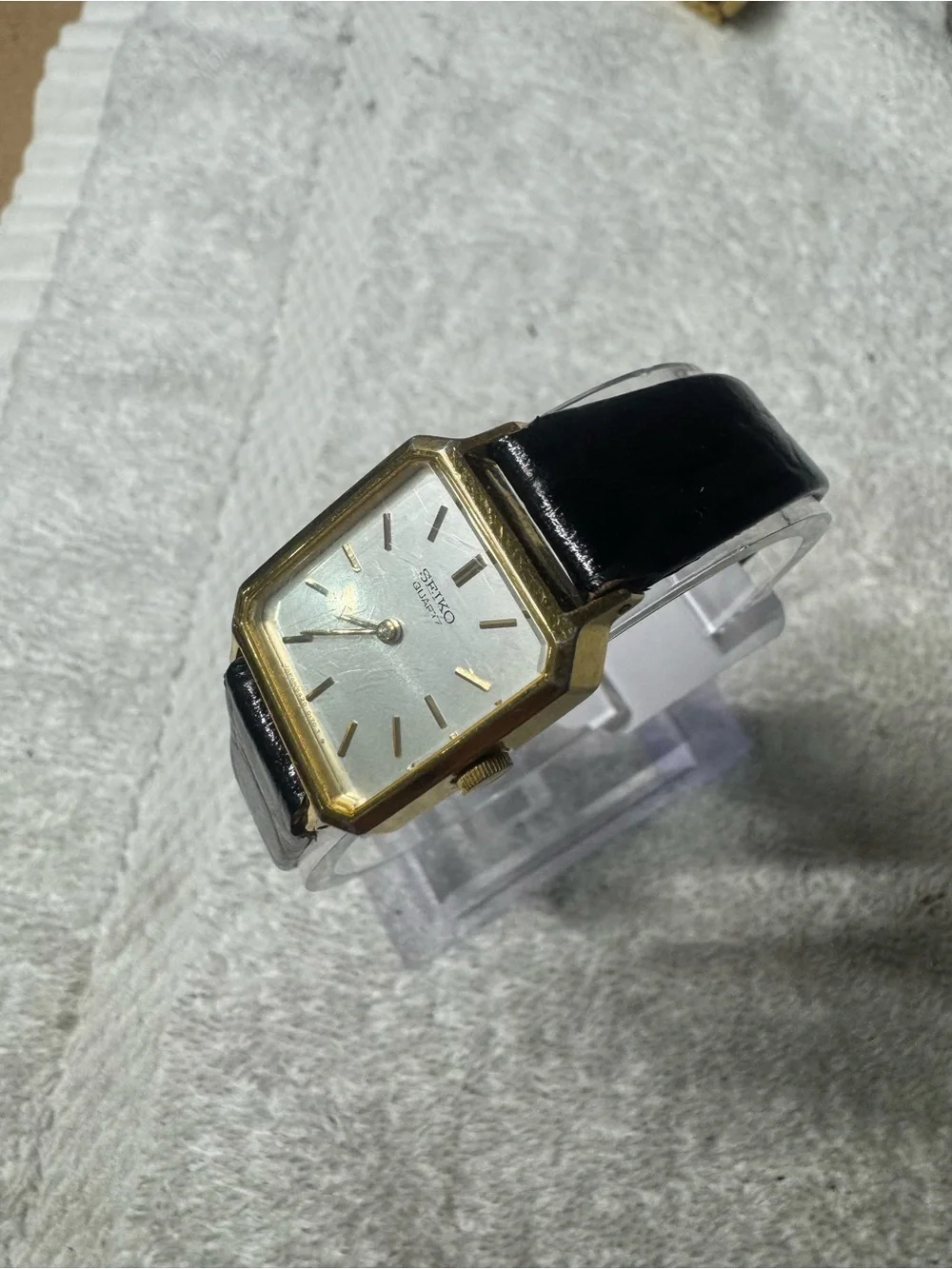Seiko Gold Tone Square Watch with Silver Dial and Black Strap